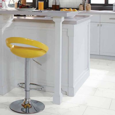 large white tiles in a beautiful bright kitchen